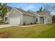 Attractive single-Gathering home with a two-car garage, tidy landscaping, and a welcoming entrance on a green lawn at 167 Surfbird Rd # 649P, Summerville, SC 29486