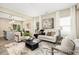 Cozy living area with stylish furniture, modern decor, and an open layout connected to the dining area at 167 Surfbird Rd # 649P, Summerville, SC 29486