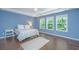 This bedroom features hardwood floors, natural light, and a spacious atmosphere at 1721 Wellstead St, Mount Pleasant, SC 29466