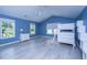 Bright bedroom with bunkbeds, a dresser, ample lighting, and stylish decor for children to enjoy at 1721 Wellstead St, Mount Pleasant, SC 29466