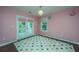 Bedroom with colorful rug, double doors to balcony, and light colored walls at 1721 Wellstead St, Mount Pleasant, SC 29466