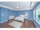 This bedroom features hardwood floors, natural light, and a spacious atmosphere at 1721 Wellstead St, Mount Pleasant, SC 29466