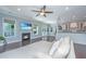 Bright living room showcases a fireplace, recessed lighting, and dark wood floors at 1721 Wellstead St, Mount Pleasant, SC 29466