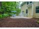 Serene backyard patio featuring outdoor seating and a peaceful wooded setting at 1721 Wellstead St, Mount Pleasant, SC 29466