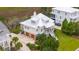 Stunning aerial view of the home, showcasing its well-manicured landscaping and convenient garage access at 1809 Rushland Grove Ln, Johns Island, SC 29455
