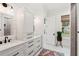 Modern bathroom with double vanity and shiplap walls at 1809 Rushland Grove Ln, Johns Island, SC 29455