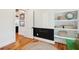 Charming entryway with hardwood floors, white shelving and chalkboard wall at 1809 Rushland Grove Ln, Johns Island, SC 29455