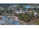 Beautiful aerial view of a waterfront community with marsh, a lake, and private docks at 1903 Bolden Dr, Mount Pleasant, SC 29466