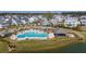 Extensive aerial view showcases a large community pool area and numerous neighborhood homes at 1903 Bolden Dr, Mount Pleasant, SC 29466