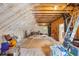 Large unfinished attic with exposed wood and insulation provides ample space for storage at 1903 Bolden Dr, Mount Pleasant, SC 29466