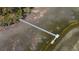 Aerial shot of long private dock surrounded by marshland leading to a covered platform at 1903 Bolden Dr, Mount Pleasant, SC 29466