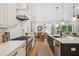 Modern kitchen with an island, stainless appliances, and open access to the dining area at 1903 Bolden Dr, Mount Pleasant, SC 29466
