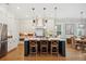 Stylish kitchen with a central island, pendant lighting, and white cabinetry at 1903 Bolden Dr, Mount Pleasant, SC 29466