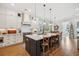 Bright kitchen featuring white cabinets, a large island with seating, and modern appliances at 1903 Bolden Dr, Mount Pleasant, SC 29466