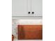 Close-up highlighting the kitchen's marble backsplash, cabinetry, and wooden accents at 1903 Bolden Dr, Mount Pleasant, SC 29466