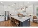 Kitchen showcasing a large center island, stainless steel appliances, and a bright, open layout at 1903 Bolden Dr, Mount Pleasant, SC 29466