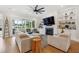 Spacious living room with built-in shelving, fireplace, plush seating, and an open floor plan at 1903 Bolden Dr, Mount Pleasant, SC 29466