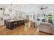 Open-concept living space featuring a modern kitchen, dining area, and comfortable lounge with natural light at 1903 Bolden Dr, Mount Pleasant, SC 29466
