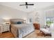 Relaxing main bedroom with a king-size bed, hardwood floors, and modern decor at 1903 Bolden Dr, Mount Pleasant, SC 29466