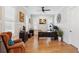 Bright office space featuring hardwood floors, a ceiling fan, and plantation shutters at 1903 Bolden Dr, Mount Pleasant, SC 29466