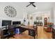 Spacious office with hardwood floors, modern ceiling fan, and a large desk at 1903 Bolden Dr, Mount Pleasant, SC 29466