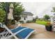 Concrete patio features outdoor seating and lush garden at 1903 Bolden Dr, Mount Pleasant, SC 29466