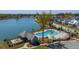 Aerial shot of a community pool area with seating, a covered pavilion, and lush landscaping at 1903 Bolden Dr, Mount Pleasant, SC 29466
