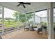 Relaxing screened in porch with comfortable seating and backyard views at 1903 Bolden Dr, Mount Pleasant, SC 29466