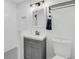 Stylish bathroom boasts modern vanity, sleek fixtures, and a tiled shower with a niche at 1909 Swift Ave, Charleston, SC 29407