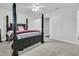 Bright bedroom features a ceiling fan, a walk-in closet, and an ensuite bathroom at 1909 Swift Ave, Charleston, SC 29407