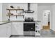 Well-lit kitchen with modern appliances, sleek cabinetry, and ample counter space at 1909 Swift Ave, Charleston, SC 29407
