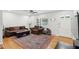 Inviting living room featuring a decorative rug, comfortable seating, and plenty of natural light at 2058 Bishop Dr, Charleston, SC 29414