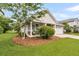 Beautiful home with stone and light gray siding and a two car garage at 241 Clayburne Dr, Goose Creek, SC 29445