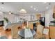 Open living space featuring a kitchen, dining area, and living room with wood flooring and recessed lighting at 241 Clayburne Dr, Goose Creek, SC 29445