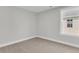 Cozy bedroom with a window offers a serene space at 2477 Sawlog Ln, Summerville, SC 29486