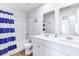 Bathroom featuring a double vanity and tub with shower at 266 Ivory Shadow Rd, Summerville, SC 29486
