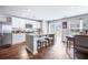Modern kitchen featuring stainless steel appliances, granite countertops, and a breakfast bar with seating at 266 Ivory Shadow Rd, Summerville, SC 29486