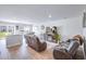 Spacious living room featuring hardwood floors and ample natural light, ideal for relaxation and entertainment at 266 Ivory Shadow Rd, Summerville, SC 29486