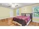 Bedroom featuring hardwood floors and a window view of the outdoor space at 2665 Ranger Dr, North Charleston, SC 29405