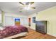 Cozy bedroom with hardwood floors, ceiling fan, and a chest of drawers at 2665 Ranger Dr, North Charleston, SC 29405