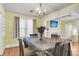 Bright dining room with hardwood floors, neutral paint, and built in fireplace at 2665 Ranger Dr, North Charleston, SC 29405