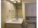 Bright bathroom with white cabinets, updated fixtures, and ample storage space at 287 Driftwood Ln, Edisto Beach, SC 29438