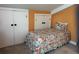 Small bedroom with two large closets and a floral-print bed at 287 Driftwood Ln, Edisto Beach, SC 29438