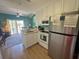 Well-equipped kitchen features modern appliances and ample counter space; open floorplan to living space and views at 287 Driftwood Ln, Edisto Beach, SC 29438