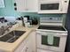 Well-equipped kitchen with modern appliances, ample counter space, and updated cabinetry at 287 Driftwood Ln, Edisto Beach, SC 29438