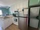 Well-equipped kitchen features modern appliances; convenient washer and dryer adds value and functionality at 287 Driftwood Ln, Edisto Beach, SC 29438