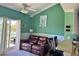 Inviting living room featuring a comfortable sofa and bright decor with a sliding glass door at 287 Driftwood Ln, Edisto Beach, SC 29438