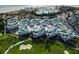 Stunning aerial view of the community with golf course, pool, and beach access at 2909 Atrium Villa, 9, Seabrook Island, SC 29455