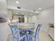 Dining area with seating for four, open to the kitchen and living room area at 2909 Atrium Villa, 9, Seabrook Island, SC 29455