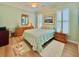 Comfortable bedroom featuring shutters, a ceiling fan, and ample natural light at 310 Waterlily Way, Summerville, SC 29486